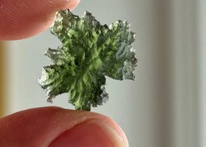 Certified Czech Moldavite stones in natural and faceted forms