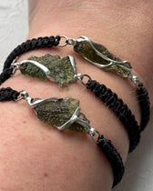 Moldavite bracelet with 1.2g transparent stone from Chlum on black braided cord