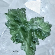 Natural 2.3g Ježkovna Moldavite from Besednice with a transparent green colour and sculpted surface