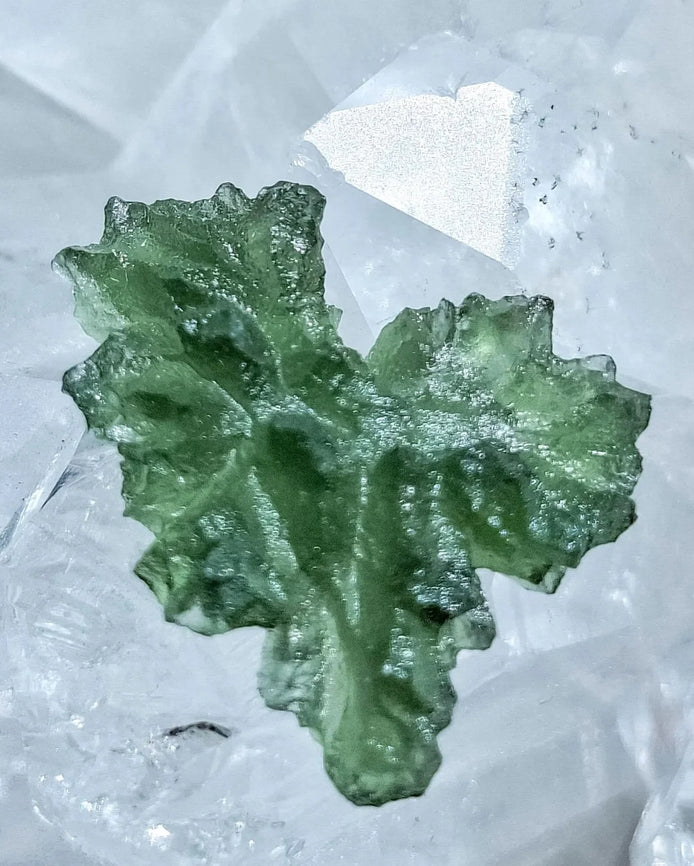 Natural 2.3g Ježkovna Moldavite from Besednice with a transparent green colour and sculpted surface