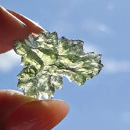 Ježkovna Moldavite from Besednice with a transparent green colour and sculpted surface