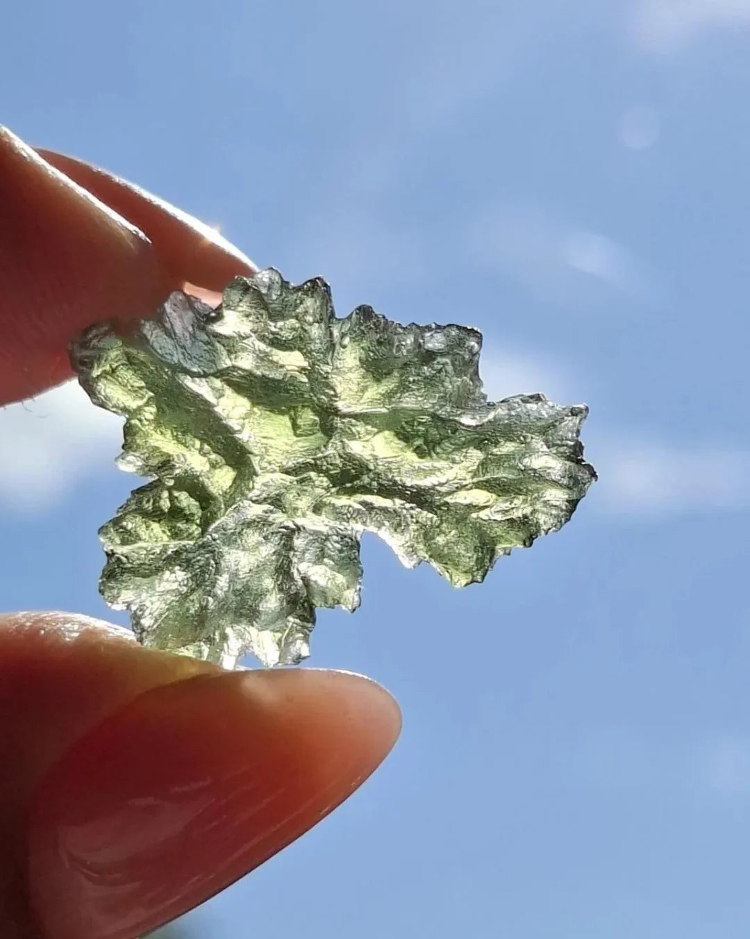Ježkovna Moldavite from Besednice with a transparent green colour and sculpted surface
