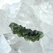 Natural 2.3g Ježkovna Moldavite from Besednice with a transparent green colour and sculpted surface