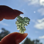 Natural 2.3g Ježkovna Moldavite from Besednice with a transparent green colour and sculpted surface
