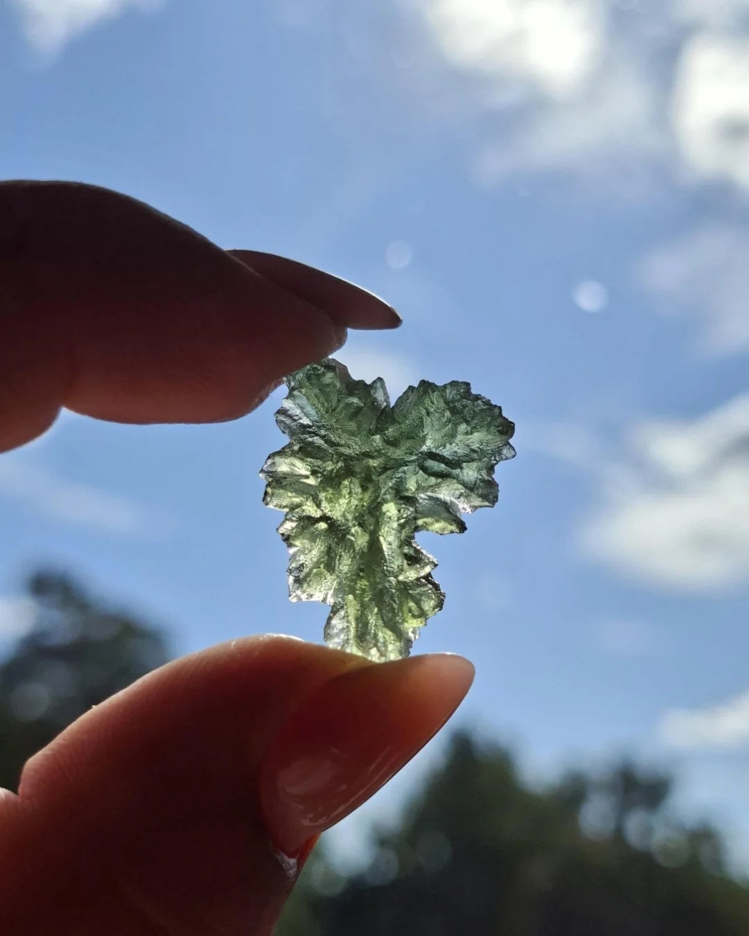 Natural 2.3g Ježkovna Moldavite from Besednice with a transparent green colour and sculpted surface