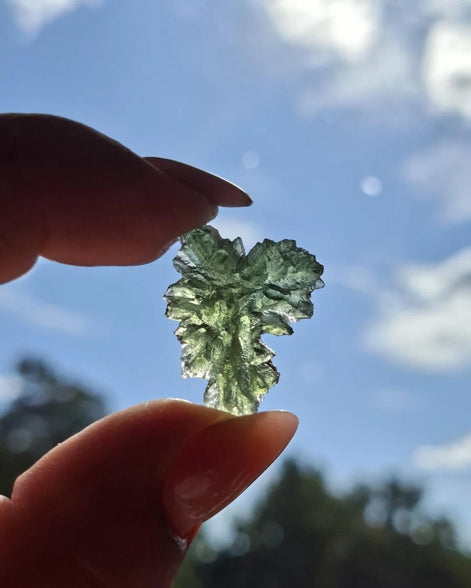 Natural 2.3g Ježkovna Moldavite from Besednice with a transparent green colour and sculpted surface