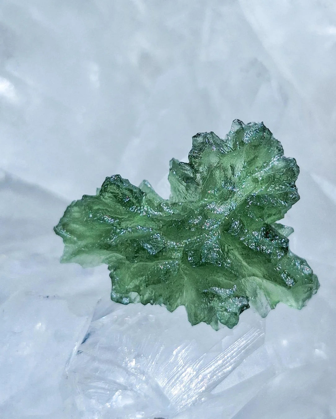 Natural 2.3g Ježkovna Moldavite from Besednice with a transparent green colour and sculpted surface