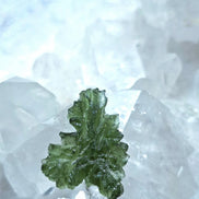 Natural 2.3g Ježkovna Moldavite from Besednice with a transparent green colour and sculpted surface