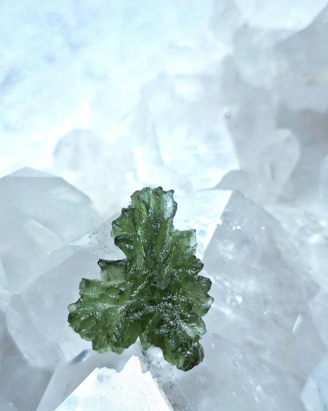 Natural 2.3g Ježkovna Moldavite from Besednice with a transparent green colour and sculpted surface