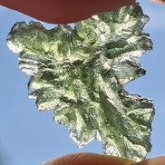 Natural 2.3g Ježkovna Moldavite from Besednice with a transparent green colour and sculpted surface