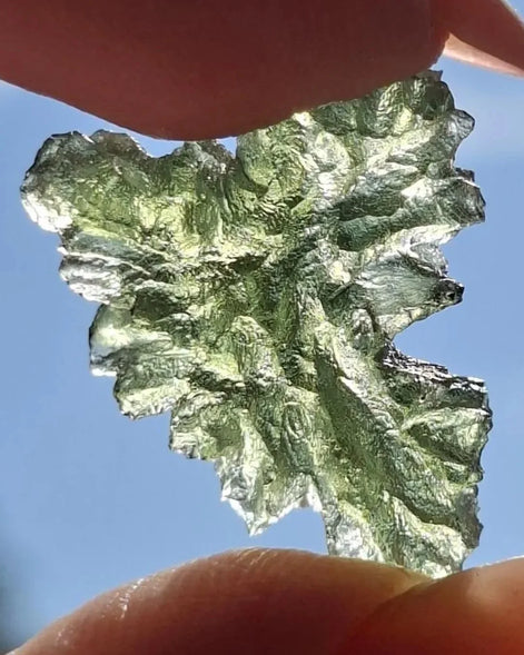 Natural 2.3g Ježkovna Moldavite from Besednice with a transparent green colour and sculpted surface