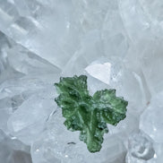 Natural 2.3g Ježkovna Moldavite from Besednice with a transparent green colour and sculpted surface