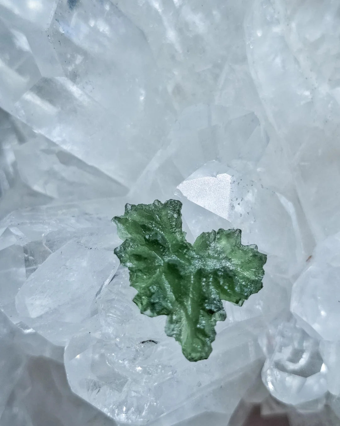 Natural 2.3g Ježkovna Moldavite from Besednice with a transparent green colour and sculpted surface