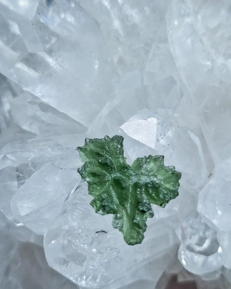 Natural 2.3g Ježkovna Moldavite from Besednice with a transparent green colour and sculpted surface