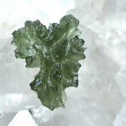 Natural 2.3g Ježkovna Moldavite from Besednice with a transparent green colour and sculpted surface