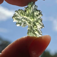 Natural 2.3g Ježkovna Moldavite from Besednice with a transparent green colour and sculpted surface