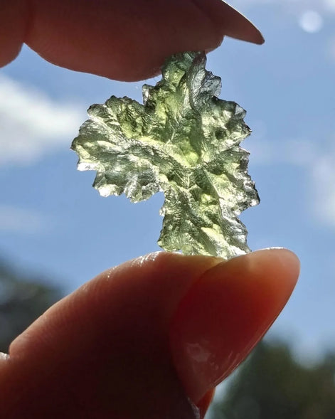 Natural 2.3g Ježkovna Moldavite from Besednice with a transparent green colour and sculpted surface