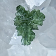 Natural 2.3g Ježkovna Moldavite from Besednice with a transparent green colour and sculpted surface