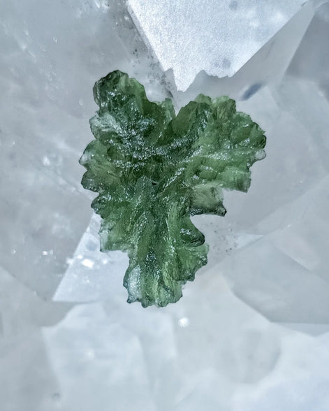 Natural 2.3g Ježkovna Moldavite from Besednice with a transparent green colour and sculpted surface