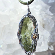 Transparent green 2.0 g Moldavite pendant from Maruškovo Pole wrapped in stainless steel wire with a gold-plated round bead