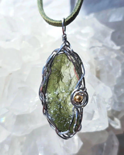 Transparent green 2.0 g Moldavite pendant from Maruškovo Pole wrapped in stainless steel wire with a gold-plated round bead