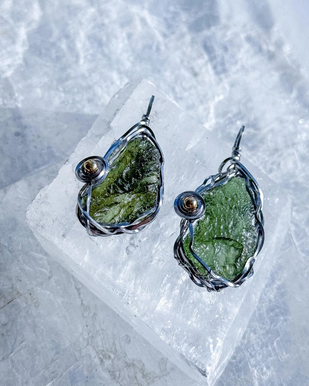 Transparent green 2.0 g Moldavite pendant from Maruškovo Pole wrapped in stainless steel wire with a gold-plated round bead