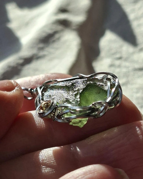 Transparent green 2.0 g Moldavite pendant from Maruškovo Pole wrapped in stainless steel wire with a gold-plated round bead