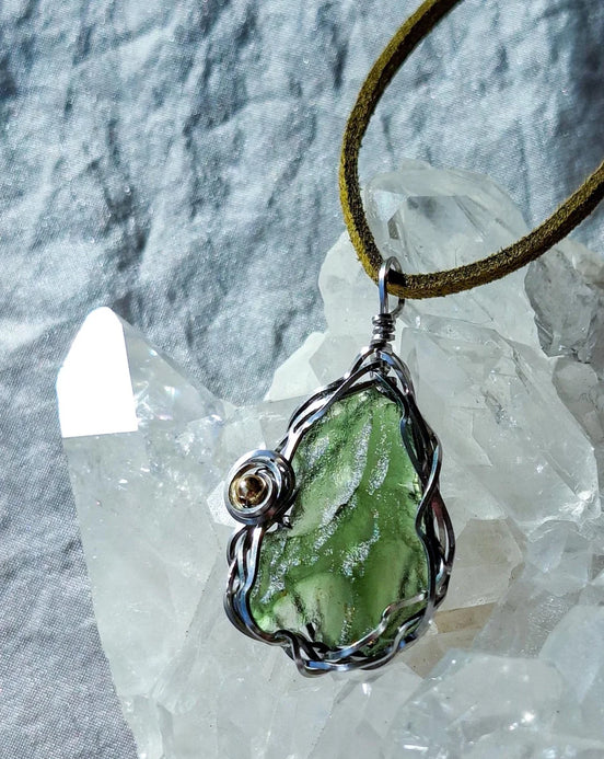 Transparent green 2.0 g Moldavite pendant from Maruškovo Pole wrapped in stainless steel wire with a gold-plated round bead