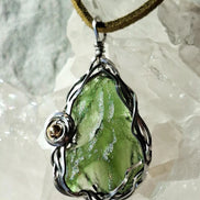 Transparent green 2.0 g Moldavite pendant from Maruškovo Pole wrapped in stainless steel wire with a gold-plated round bead