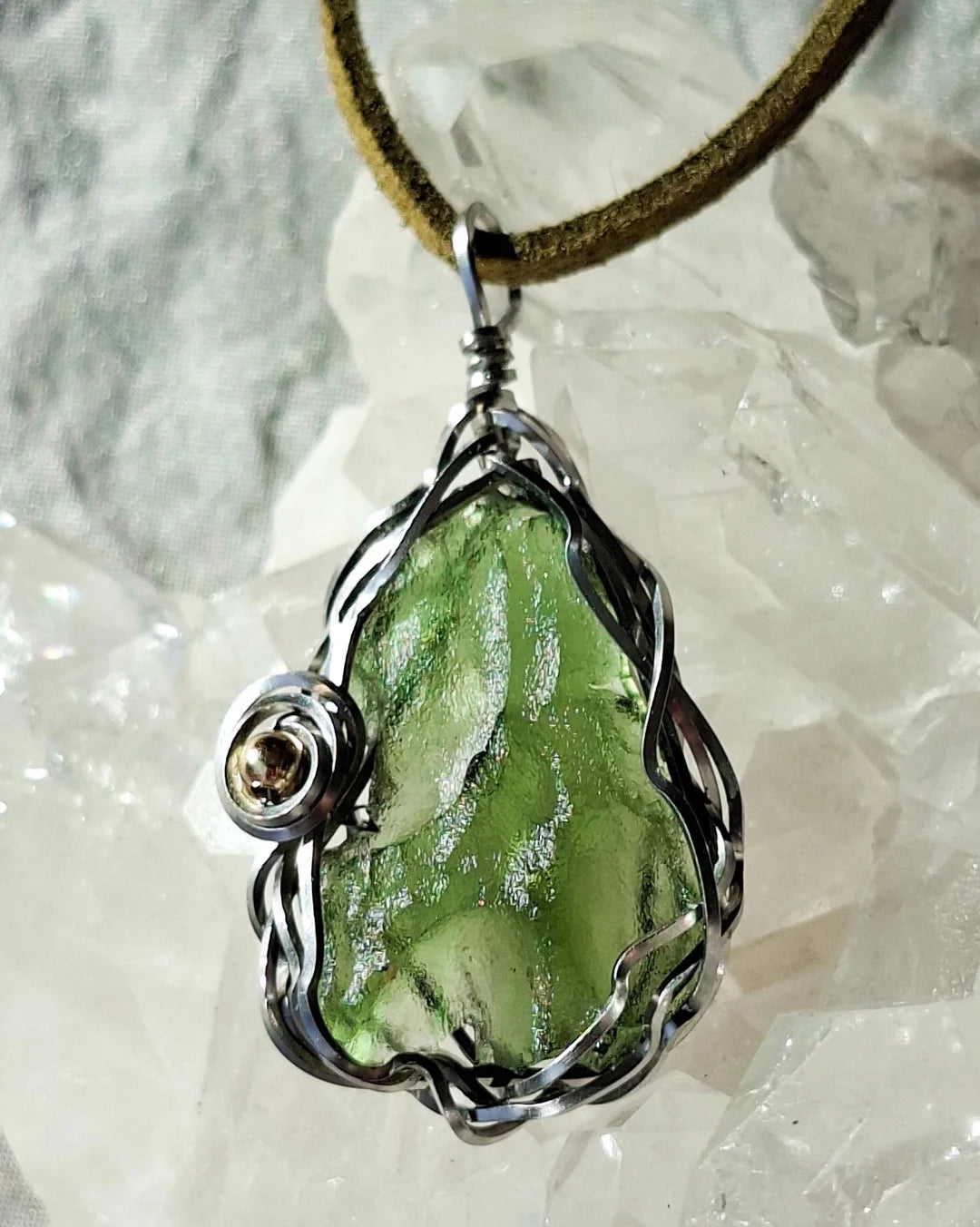 Transparent green 2.0 g Moldavite pendant from Maruškovo Pole wrapped in stainless steel wire with a gold-plated round bead