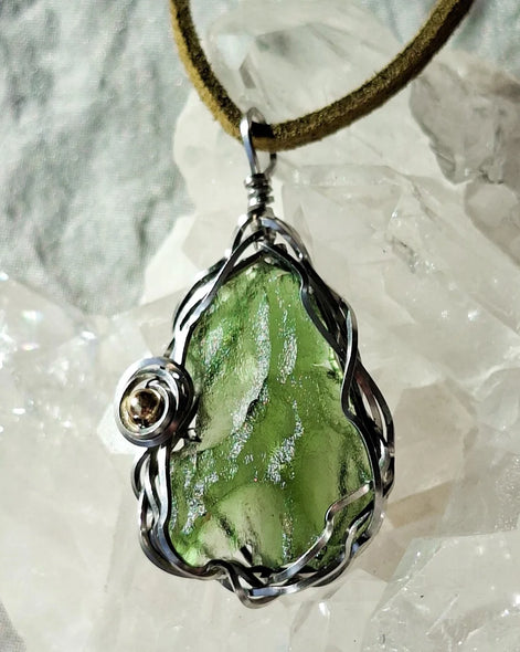 Transparent green 2.0 g Moldavite pendant from Maruškovo Pole wrapped in stainless steel wire with a gold-plated round bead