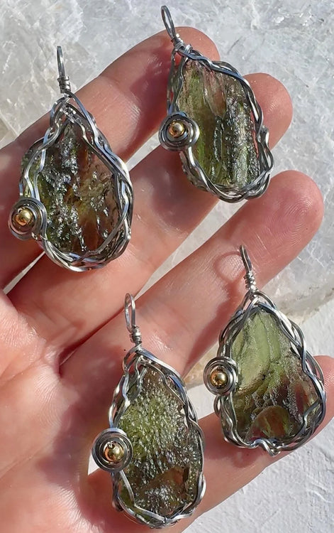 Transparent green 2.0 g Moldavite pendant from Maruškovo Pole wrapped in stainless steel wire with a gold-plated round bead