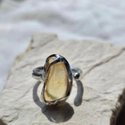 Adjustable ring with 1.2g translucent yellow Libyan Desert Glass from the Great Sand Sea, set in lead-free tin with silver content.