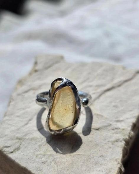 Adjustable ring with 1.2g translucent yellow Libyan Desert Glass from the Great Sand Sea, set in lead-free tin with silver content.
