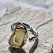 Adjustable ring with 1.2g translucent yellow Libyan Desert Glass from the Great Sand Sea, set in lead-free tin with silver content.