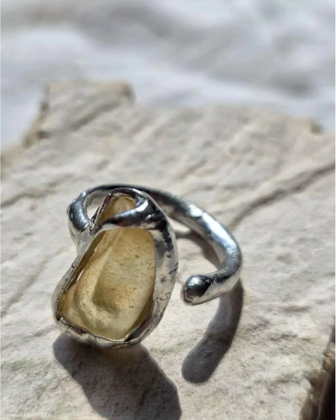 Adjustable ring with 1.2g translucent yellow Libyan Desert Glass from the Great Sand Sea, set in lead-free tin with silver content.