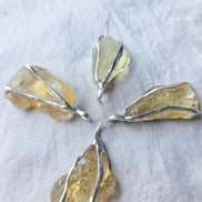 Libyan Desert Glass pendant with a genuine 3.0 g natural Libyan Desert Glass from the Great Sand Sea in a lead-free tin setting.
