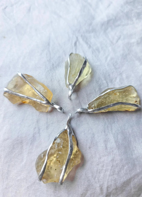 Libyan Desert Glass pendant with a genuine 3.0 g natural Libyan Desert Glass from the Great Sand Sea in a lead-free tin setting.