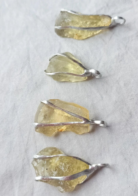 Libyan Desert Glass pendant with a genuine 6.0 g natural Libyan Desert Glass from the Great Sand Sea in a lead-free tin setting.