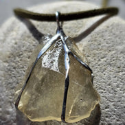 Libyan Desert Glass pendant with a genuine 6.0 g natural Libyan Desert Glass from the Great Sand Sea in a lead-free tin setting.