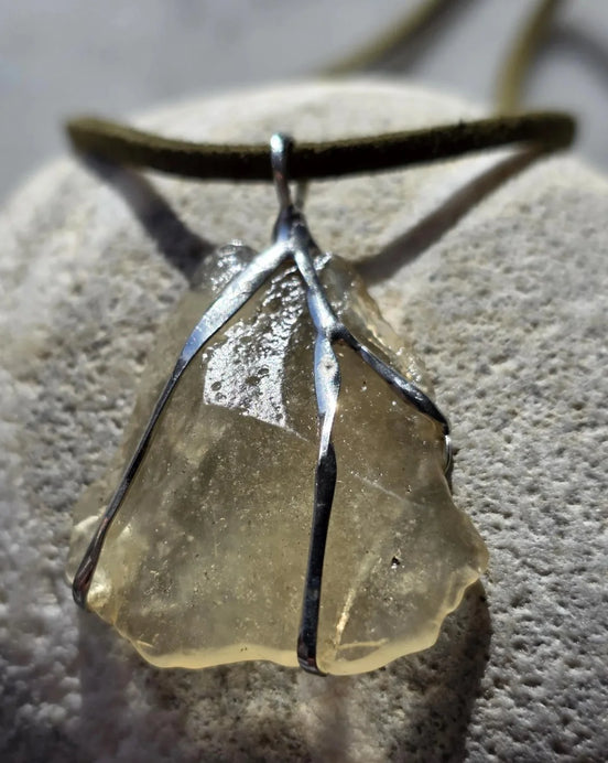 Libyan Desert Glass pendant with a genuine 6.0 g natural Libyan Desert Glass from the Great Sand Sea in a lead-free tin setting.