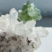 Transparent 1.34g Ježkovna Moldavite with spiked sculpting and a large open bubble