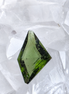 Transparent green fantasy cut Moldavite from Slavče, Czech Republic.