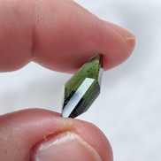 Transparent green fantasy cut Moldavite from Slavče, Czech Republic.
