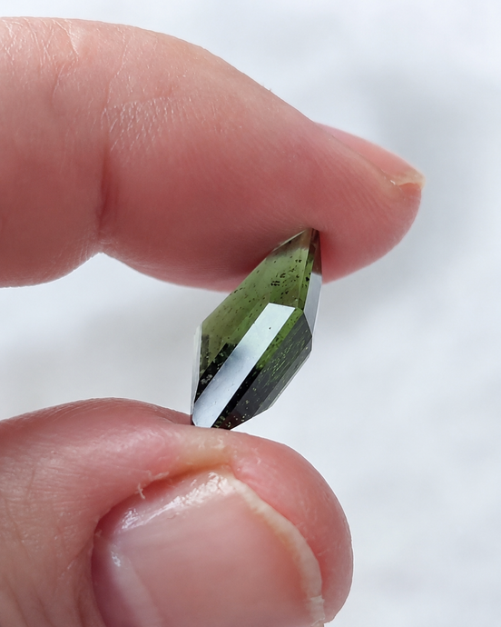 Transparent green fantasy cut Moldavite from Slavče, Czech Republic.