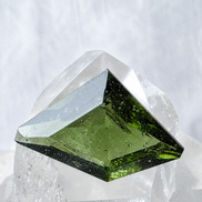 Transparent green fantasy cut Moldavite from Slavče, Czech Republic.