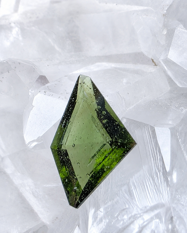 Transparent green fantasy cut Moldavite from Slavče, Czech Republic.