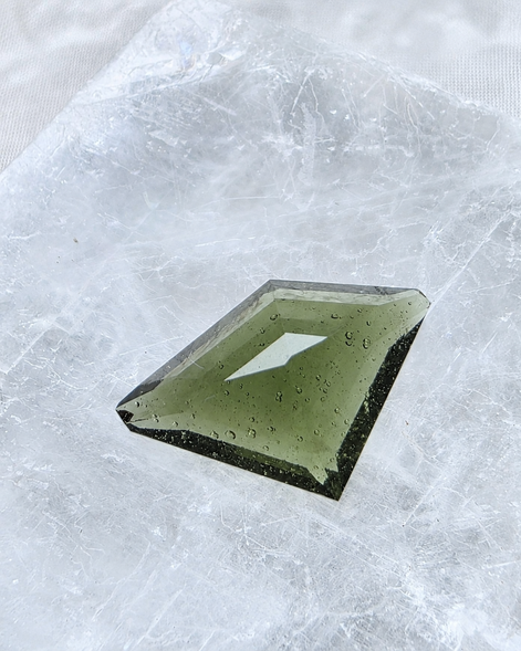 Transparent green fantasy cut Moldavite from Slavče, Czech Republic