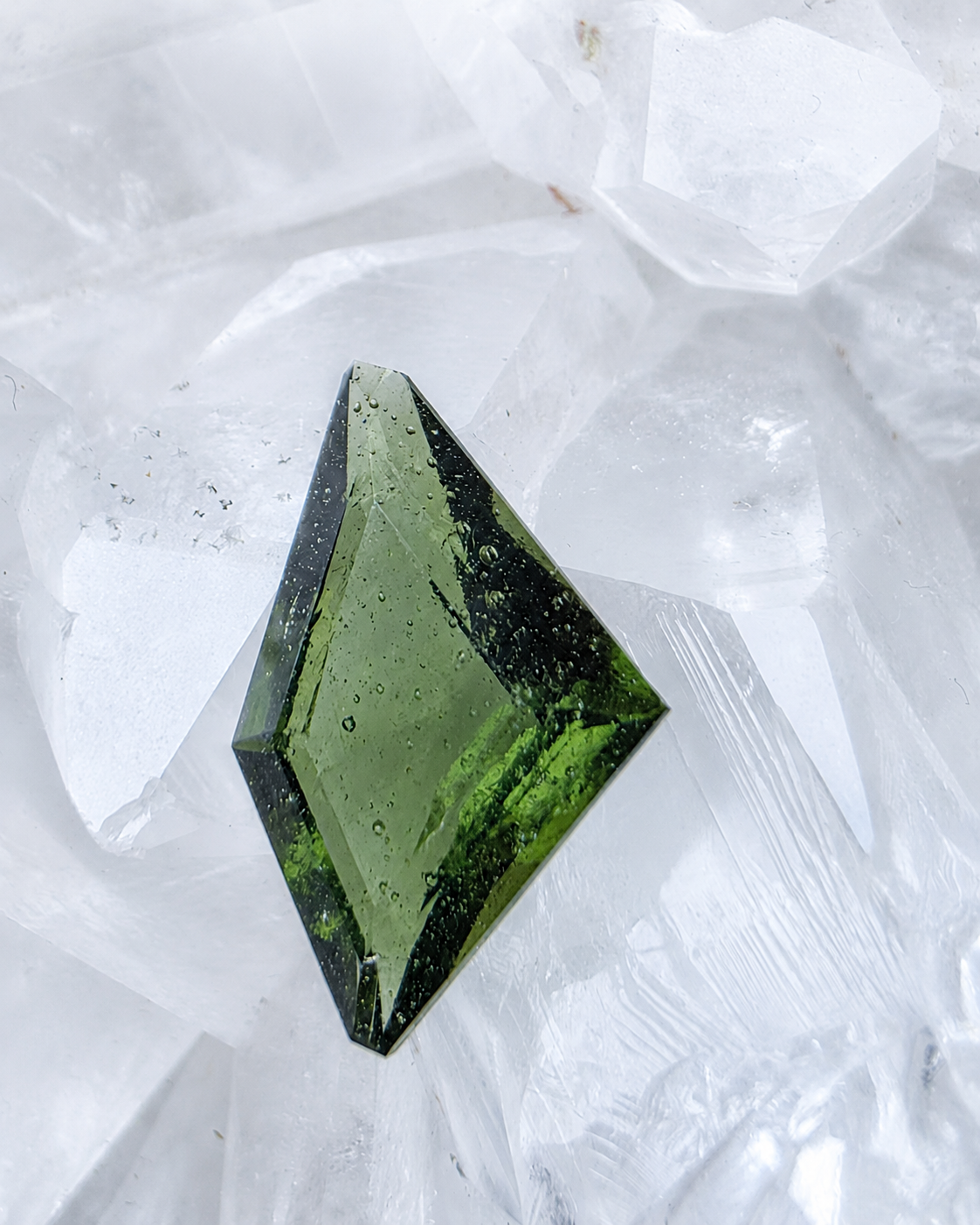 Transparent green fantasy cut Moldavite from Slavče, Czech Republic