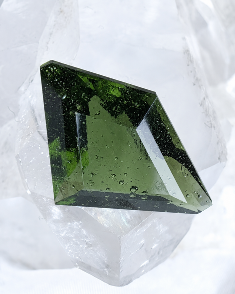 Transparent green fantasy cut Moldavite from Slavče, Czech Republic.